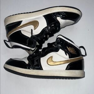 Kids Black and Gold Patent Leather Jordan’s